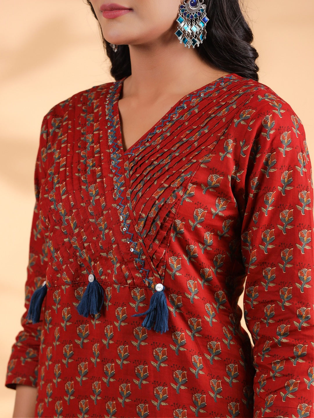 Graceful Maroon Red Floral Kurta Set with Tassel Detailing
