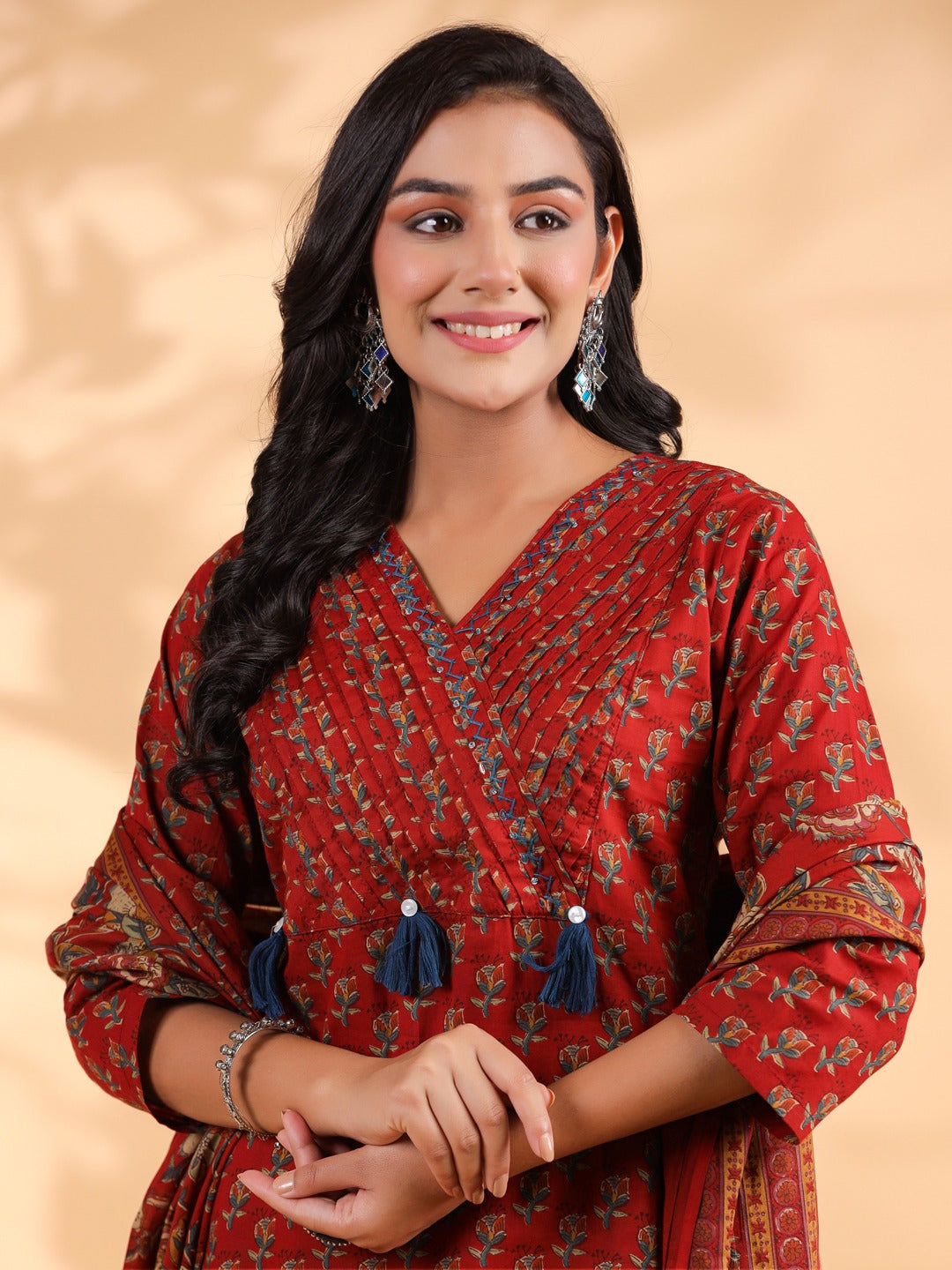 Graceful Maroon Red Floral Kurta Set with Tassel Detailing