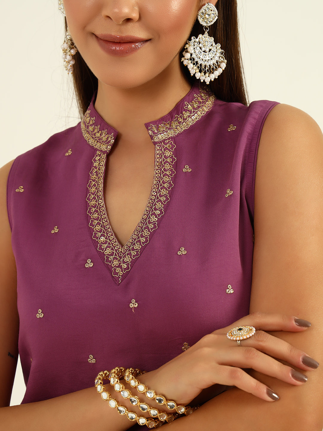 Plum Sleeveless Kurta with Embroidered Neckline & Flared Palazzo Set